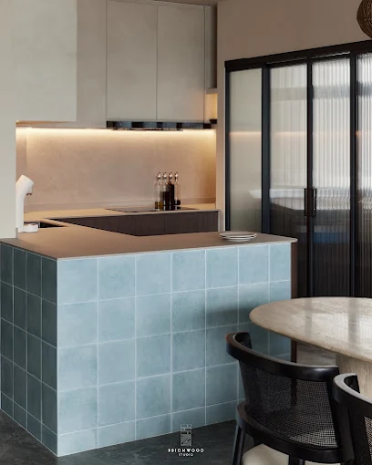 Elegant HDB hallway with bespoke partition and vanity designed by Brickwood Studio.