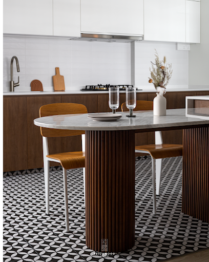 Modern HDB kitchen and dining area designed by Brickwood Studio in Singapore.